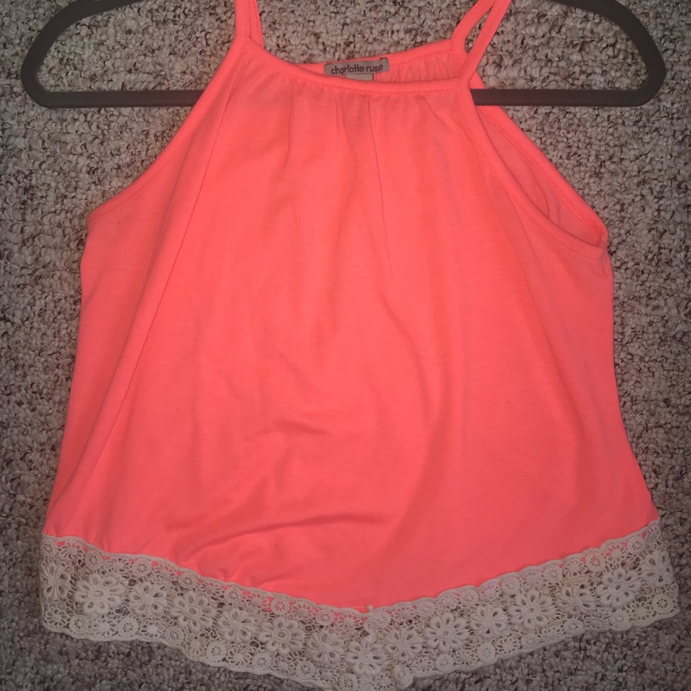 pink tank top with white trim